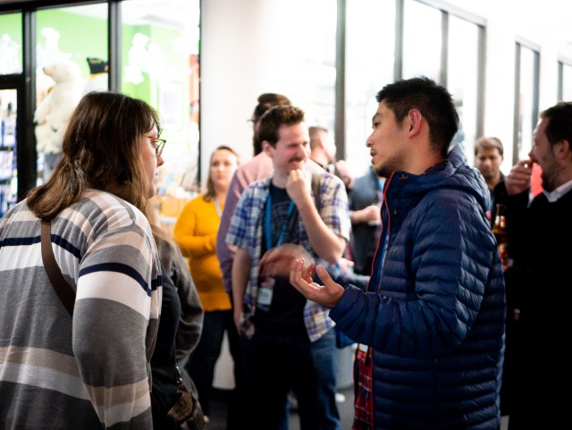 People talking at WCUS 2018